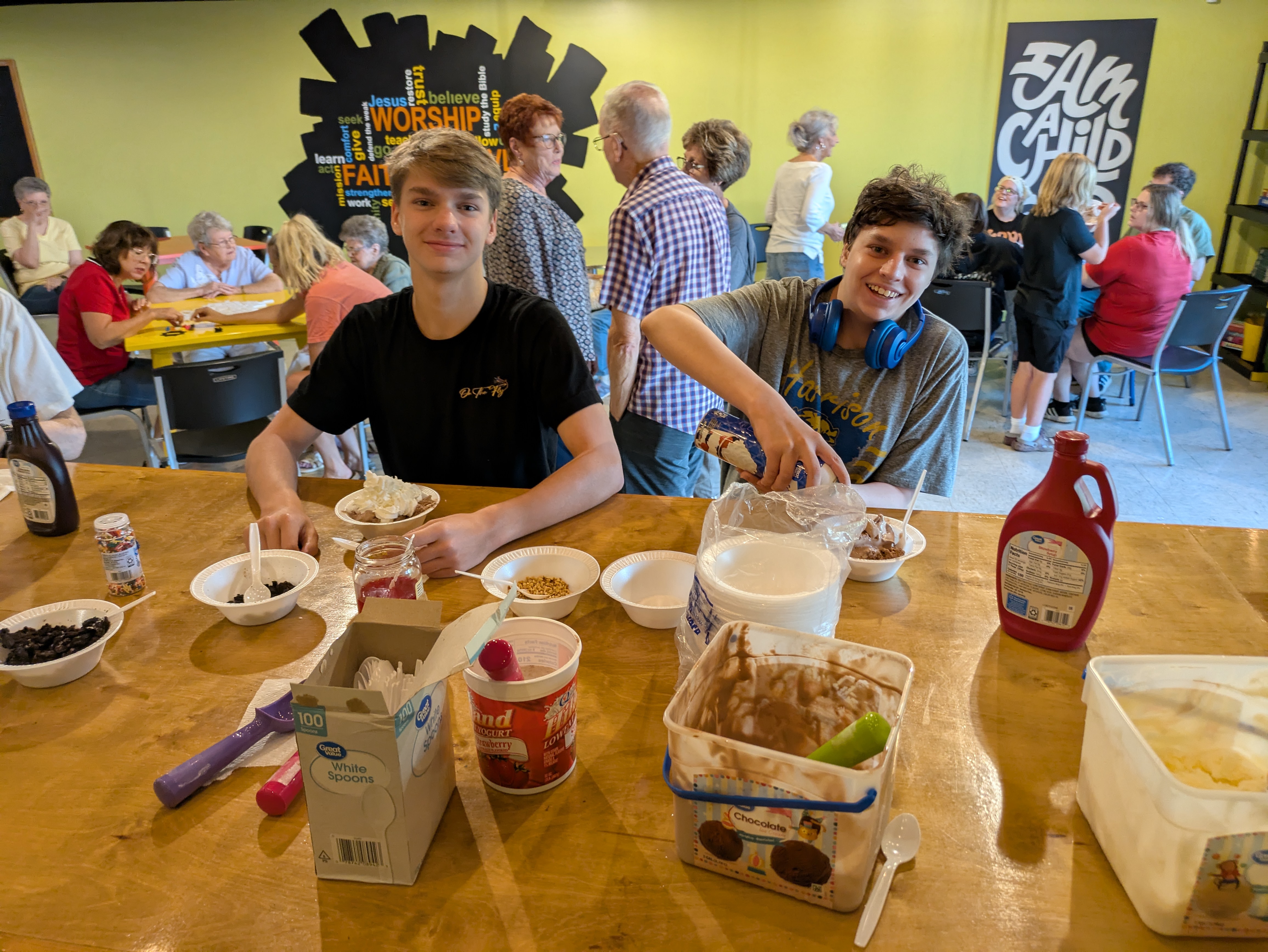Youth and congregation enjoying ice cream social at The Crossing